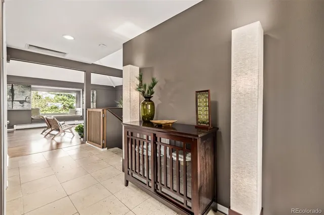 a view of a hallway with an outdoor space