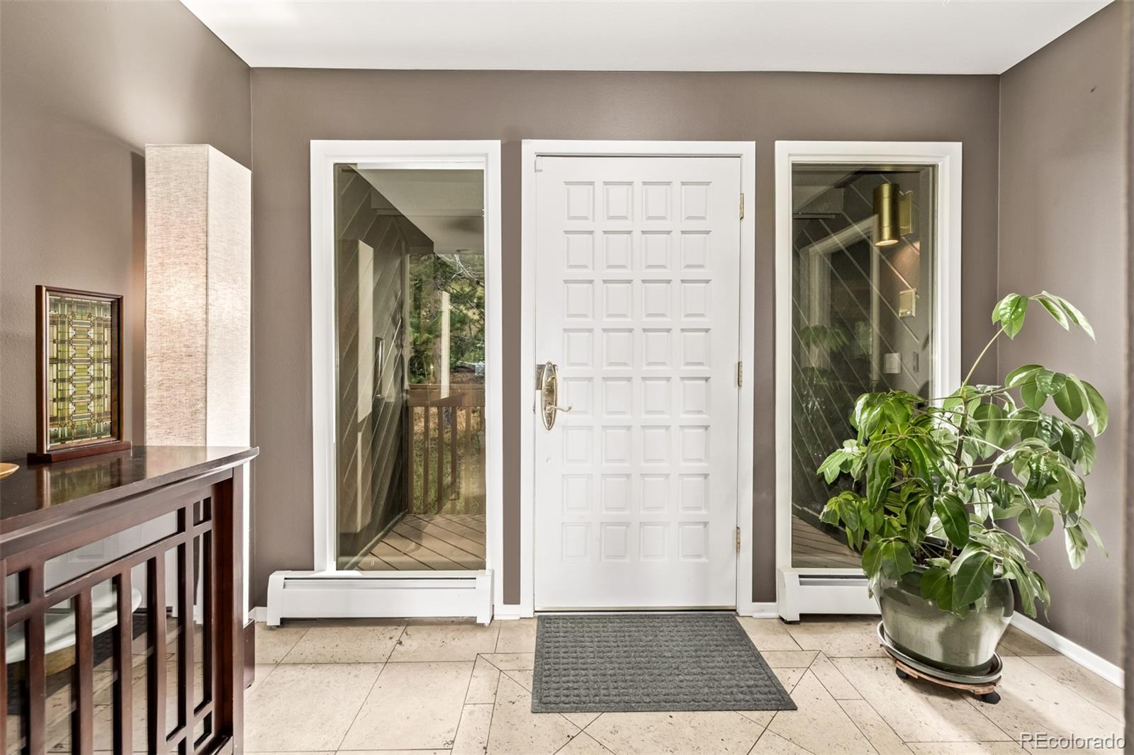 1139 Genesee Vista Road Golden, CO 80401 - Photo 4 of 43 a view of a entryway door of the house