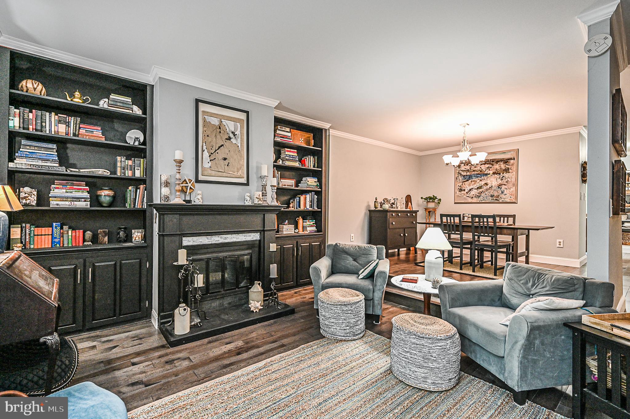 12013 Insha Court Reston, VA 20191 - Photo 16 of 35 Wood burning fireplace and built-in bookcases
