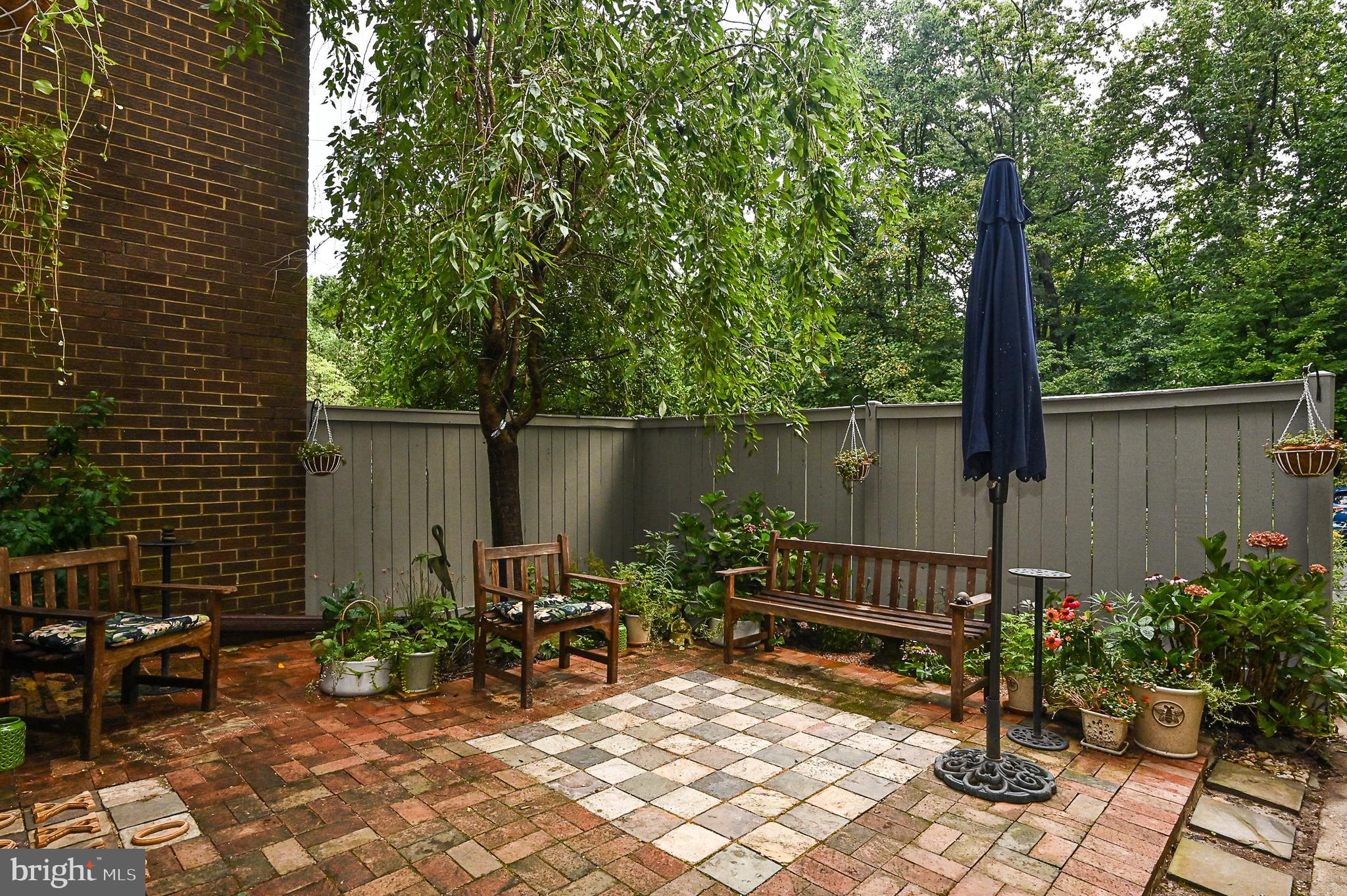 12013 Insha Court Reston, VA 20191 - Photo 3 of 35 Courtyard - with chess/checkerboard!