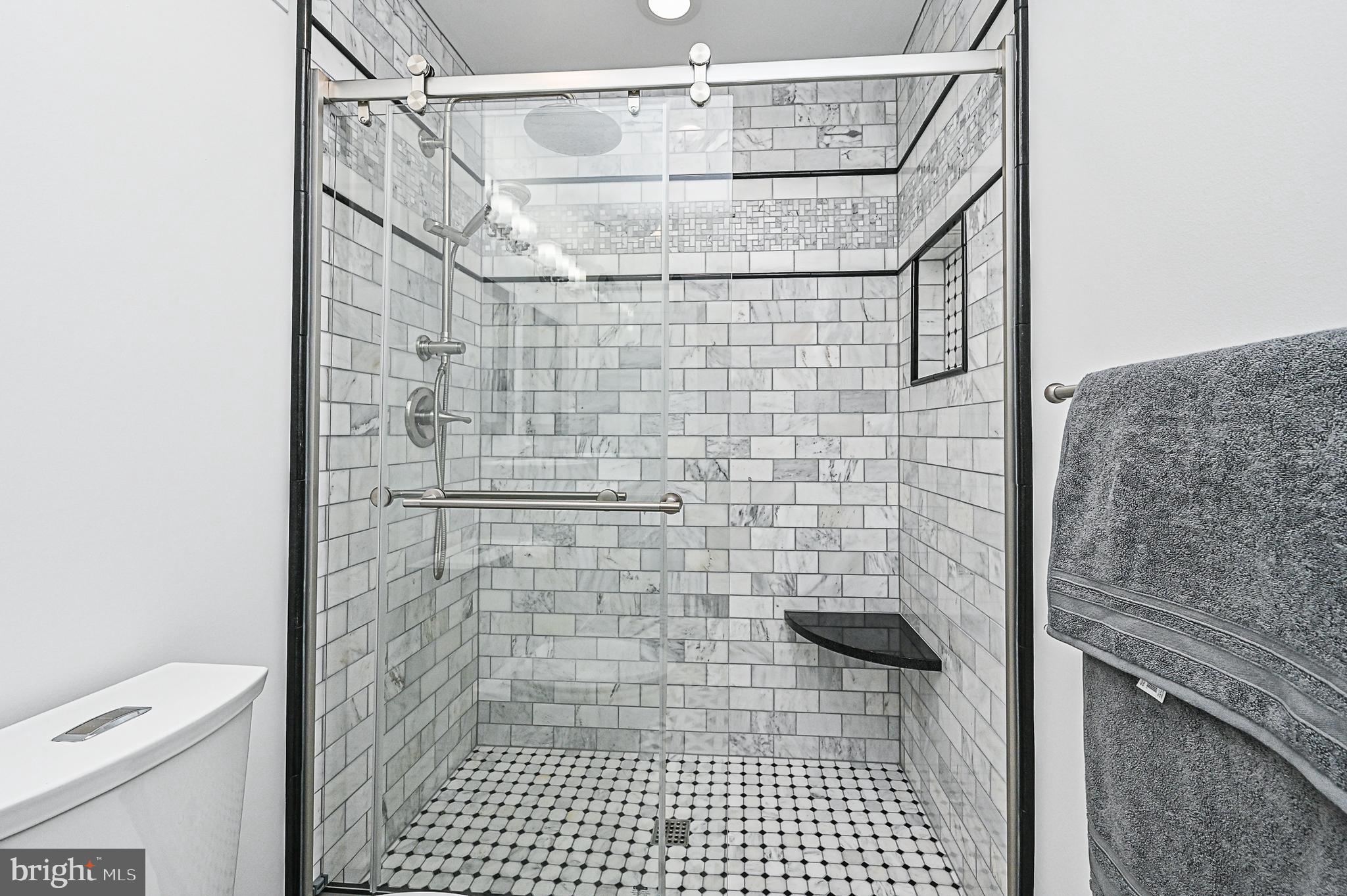 12013 Insha Court Reston, VA 20191 - Photo 23 of 35 Master bath shower with built-in seat
