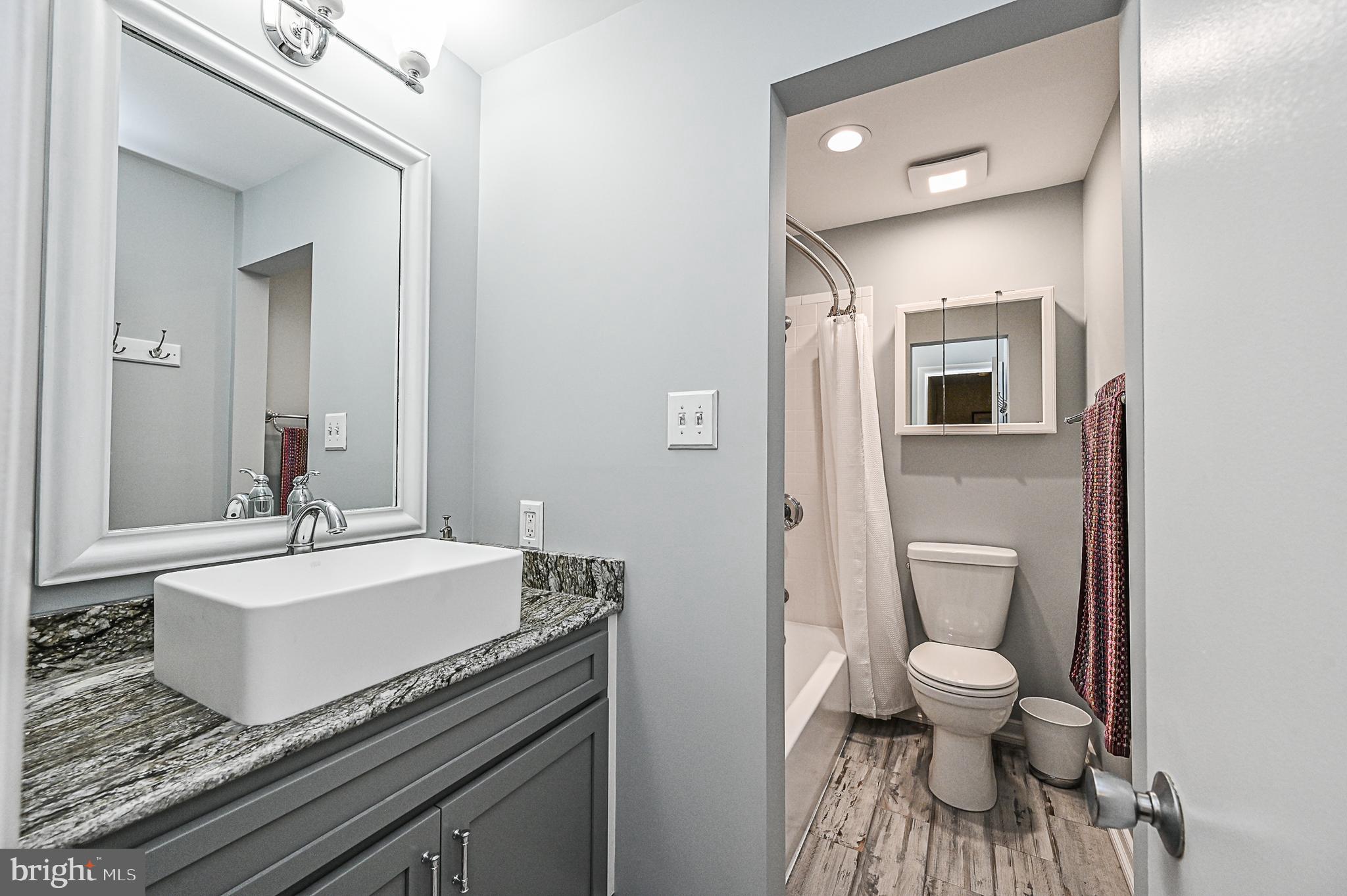 12013 Insha Court Reston, VA 20191 - Photo 27 of 35 Renovated upper level hall/guest bath.
