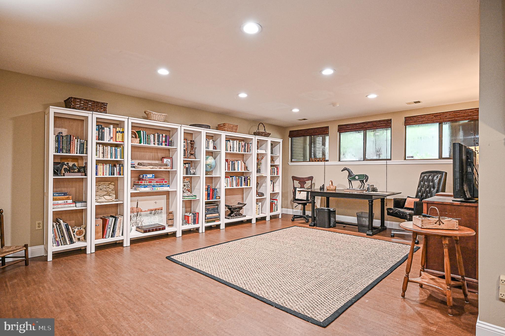 12013 Insha Court Reston, VA 20191 - Photo 29 of 35 Lower level family room w/cork flooring