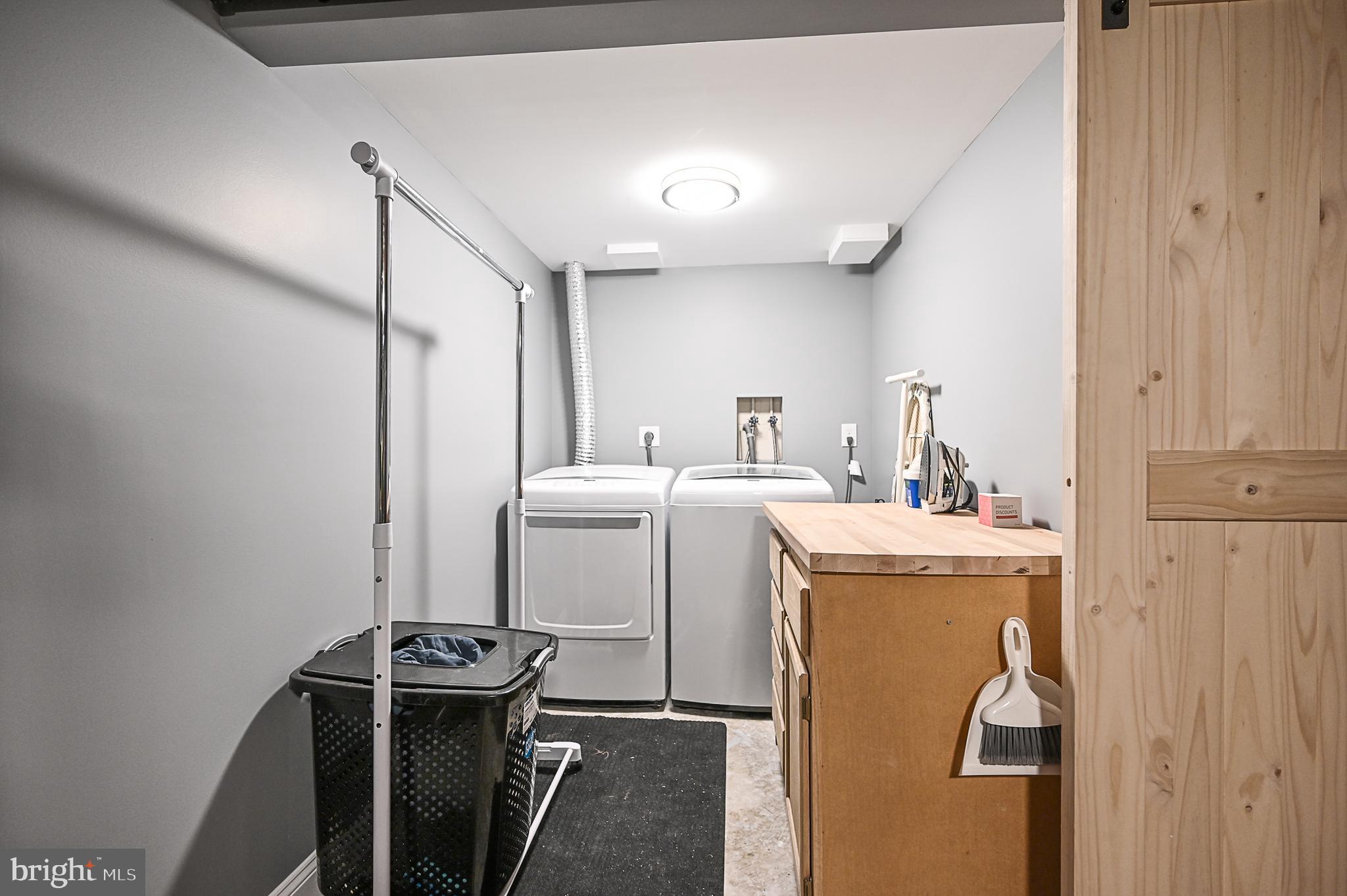 12013 Insha Court Reston, VA 20191 - Photo 32 of 35 Laundry room with slidinng barn door