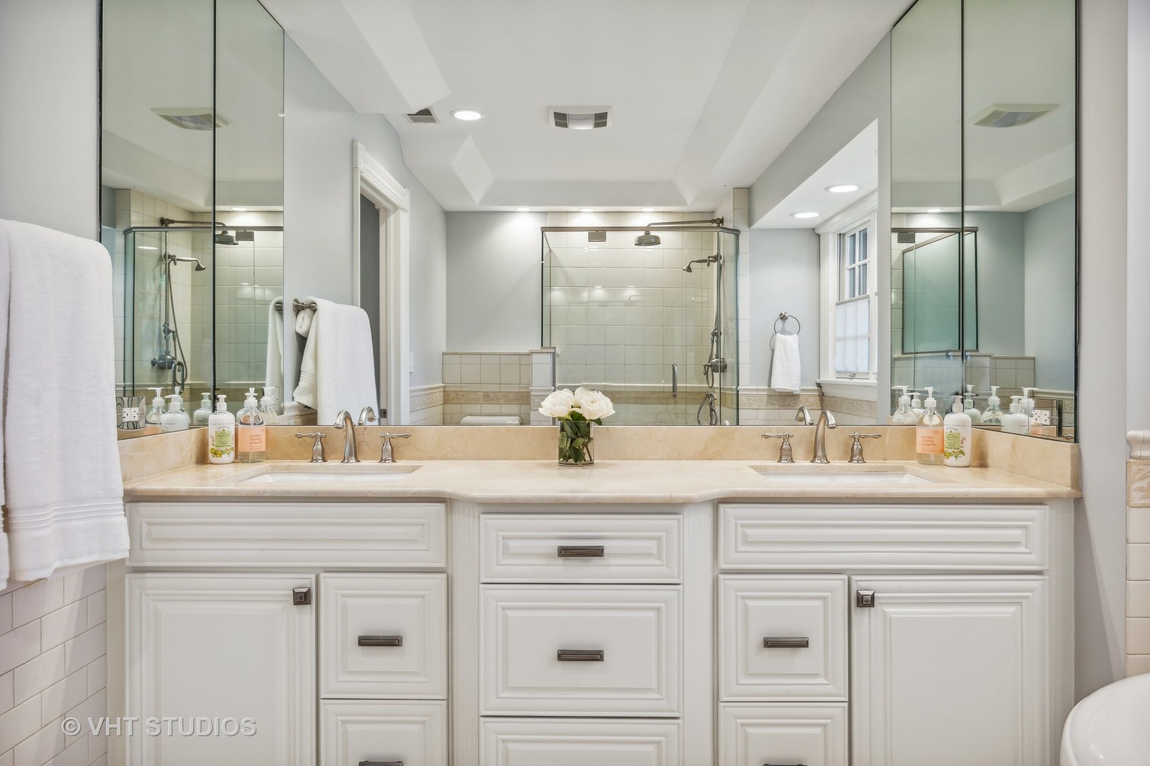576 Sunset Road Winnetka, IL 60093 - Photo 20 of 42 a bathroom with a double vanity sink mirror and double