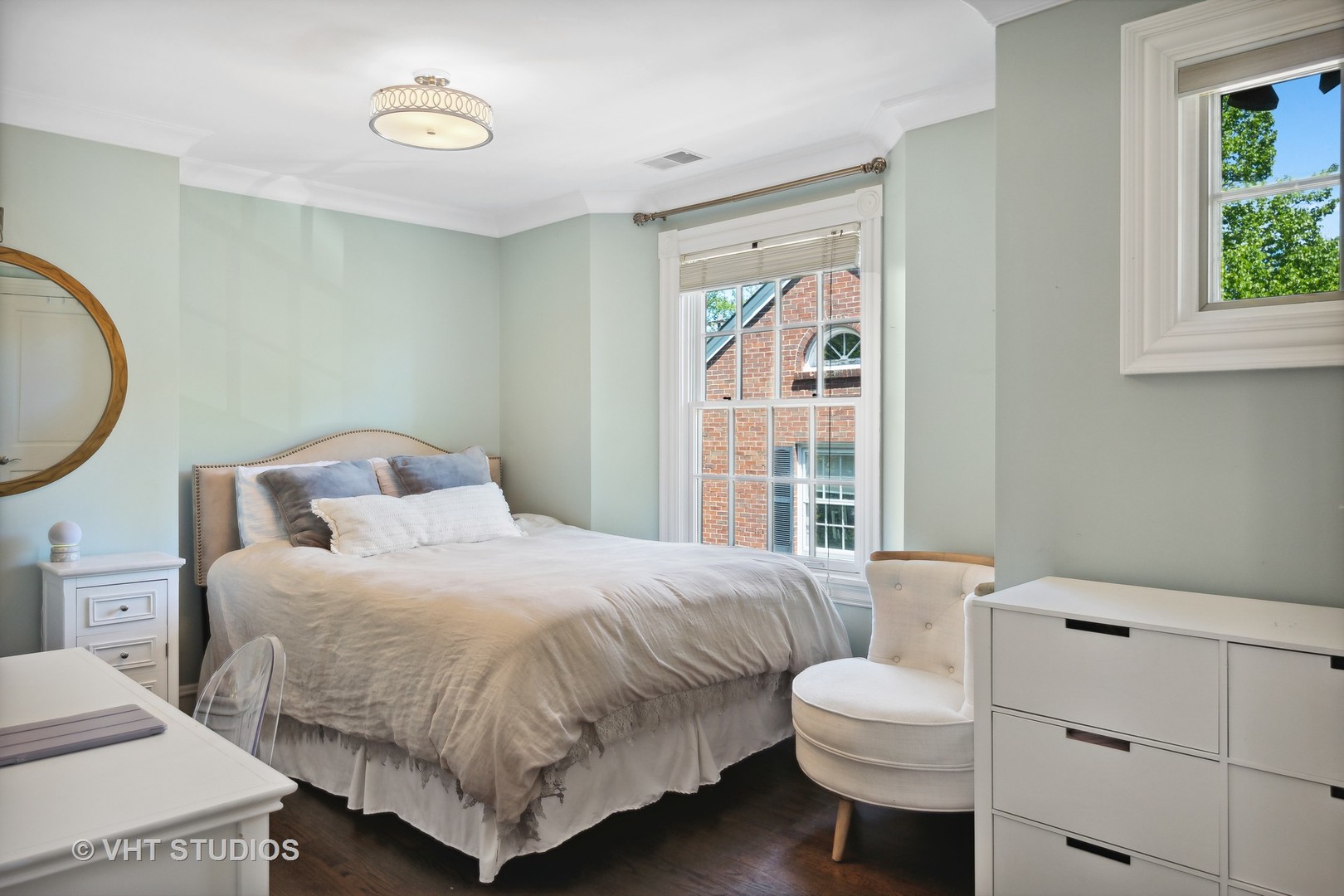 576 Sunset Road Winnetka, IL 60093 - Photo 24 of 42 a bedroom with a bed and a large window