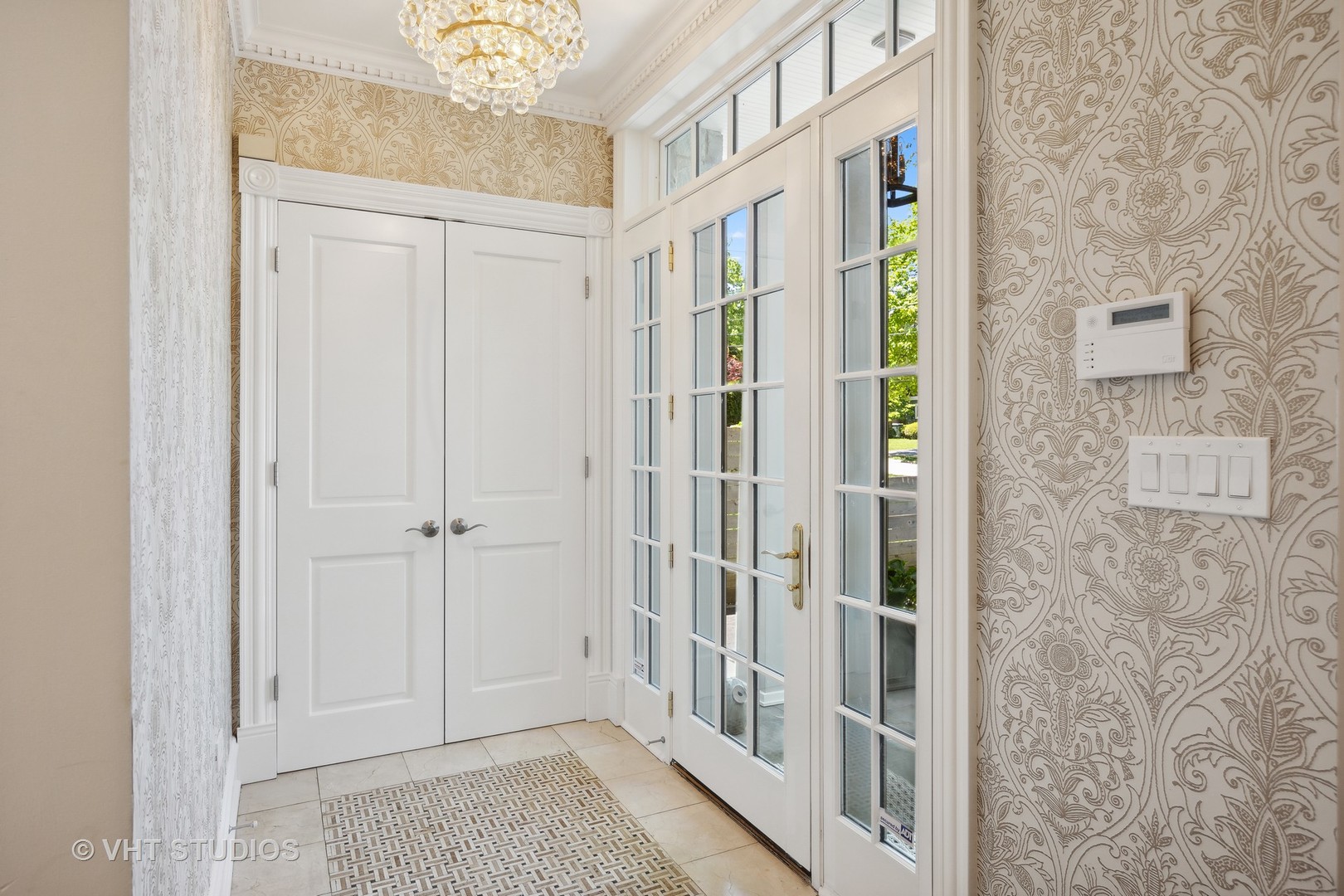576 Sunset Road Winnetka, IL 60093 - Photo 4 of 42 a view of a hallway with entryway door