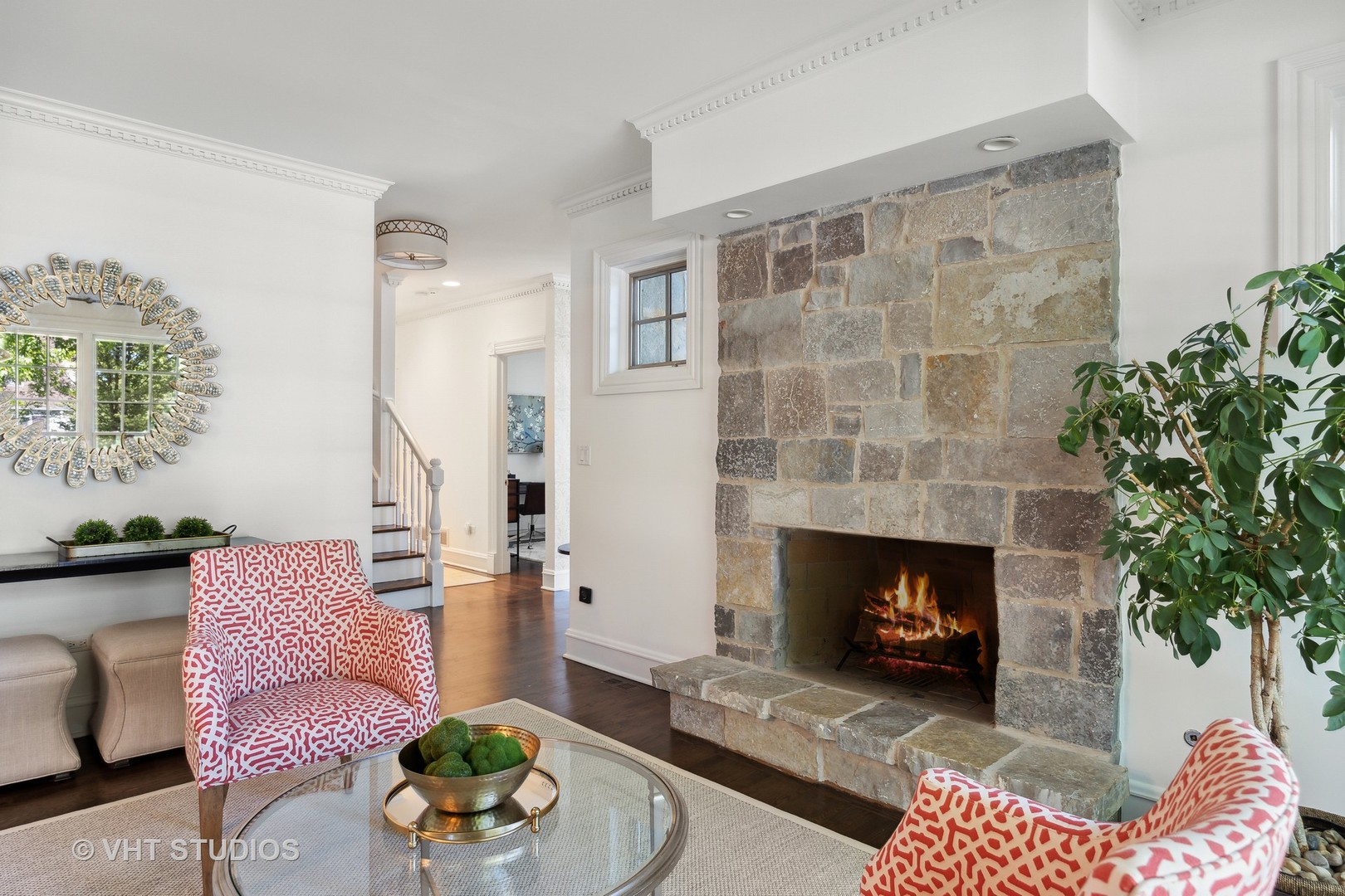 576 Sunset Road Winnetka, IL 60093 - Photo 7 of 42 a living room with furniture and a fireplace