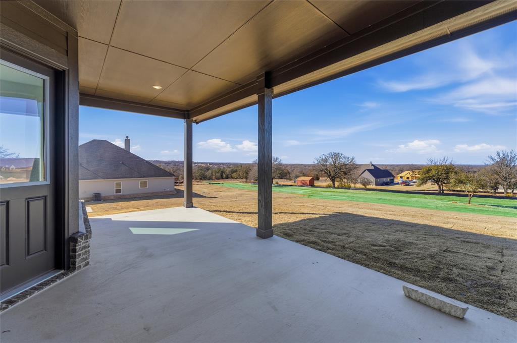 404 Hayden Faith Court Springtown, TX 76082 - Photo 21 of 24 a view of a house with a swimming pool