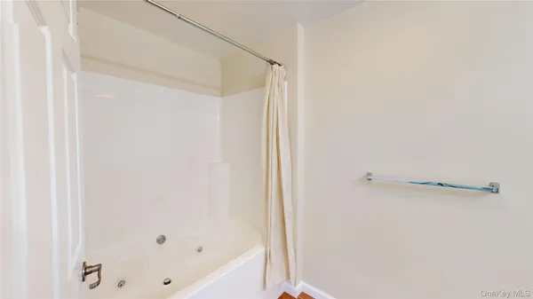 a bathroom with a bathtub