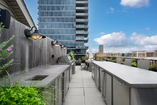 a view of a kitchen with swimming pool and outdoor seating