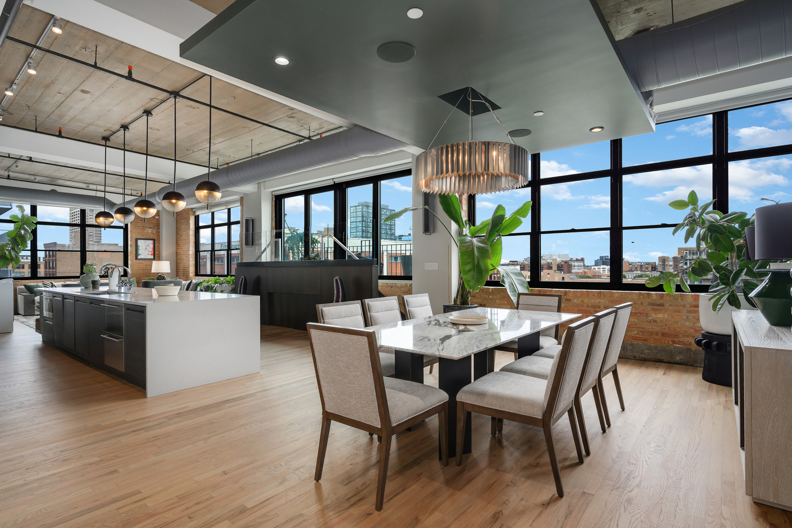 850 West Adams Street, Unit 7C Chicago, IL 60607 - Photo 3 of 32 a view of a dining room with furniture window and wooden floor