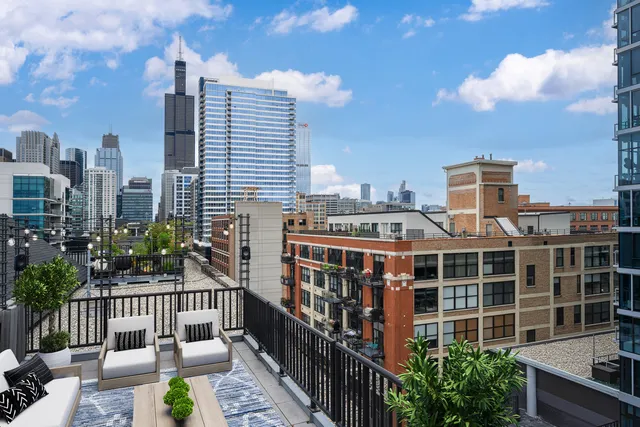 a view of a city with tall buildings