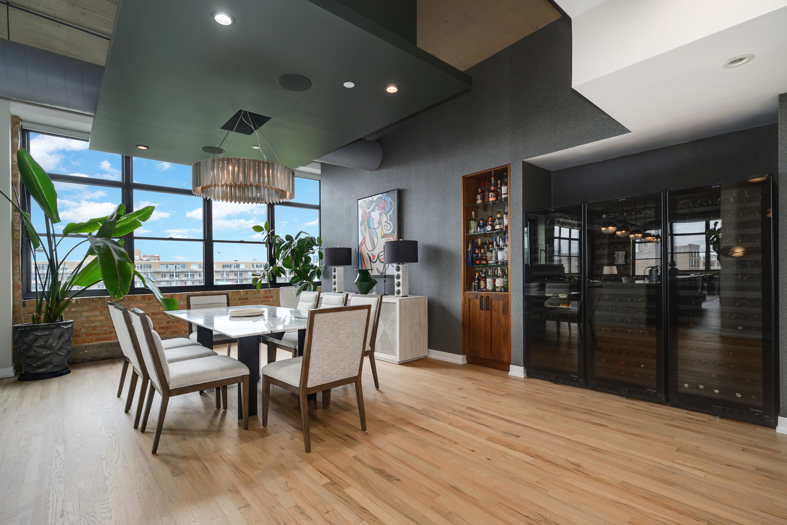 850 West Adams Street, Unit 7C Chicago, IL 60607 - Photo 4 of 32 a dining room with furniture and wooden floor