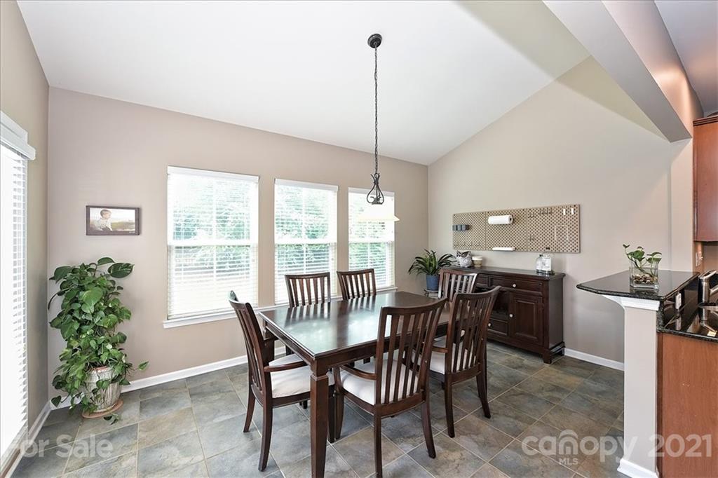 3007 Fallondale Road Waxhaw, NC 28173 - Photo 15 of 46 a view of a dining room with furniture window and outside view