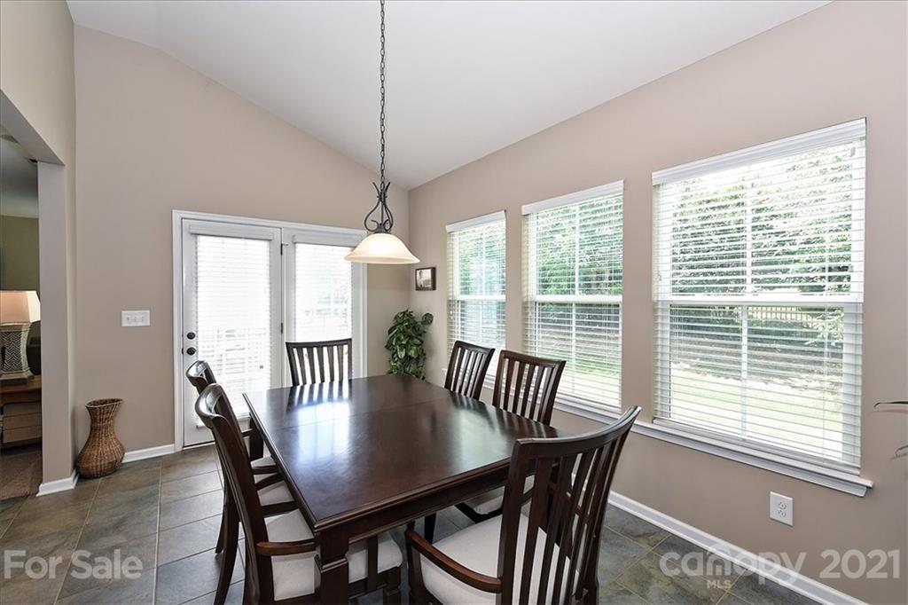 3007 Fallondale Road Waxhaw, NC 28173 - Photo 17 of 46 a view of a dining room with furniture window and outside view