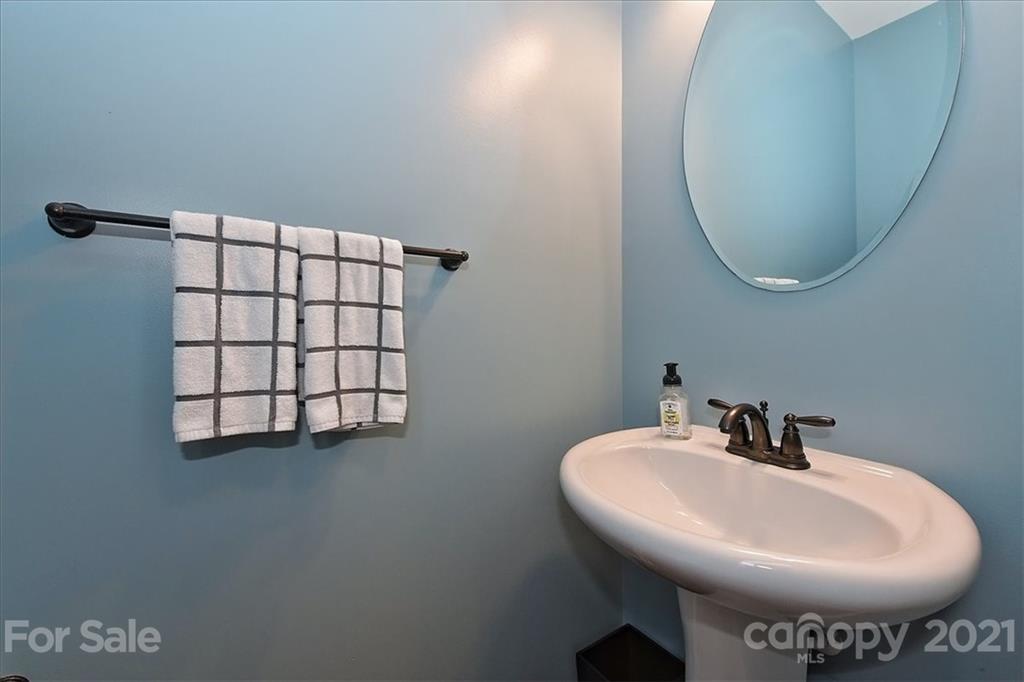 3007 Fallondale Road Waxhaw, NC 28173 - Photo 19 of 46 a bathroom with a sink and a mirror