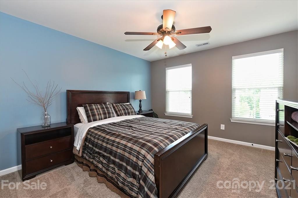 3007 Fallondale Road Waxhaw, NC 28173 - Photo 27 of 46 a bedroom with a bed and window