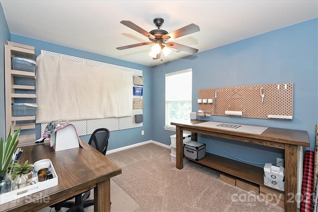 3007 Fallondale Road Waxhaw, NC 28173 - Photo 29 of 46 a view of a workspace with a window and a couch