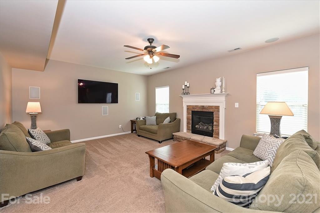 3007 Fallondale Road Waxhaw, NC 28173 - Photo 7 of 46 a living room with furniture and a fireplace