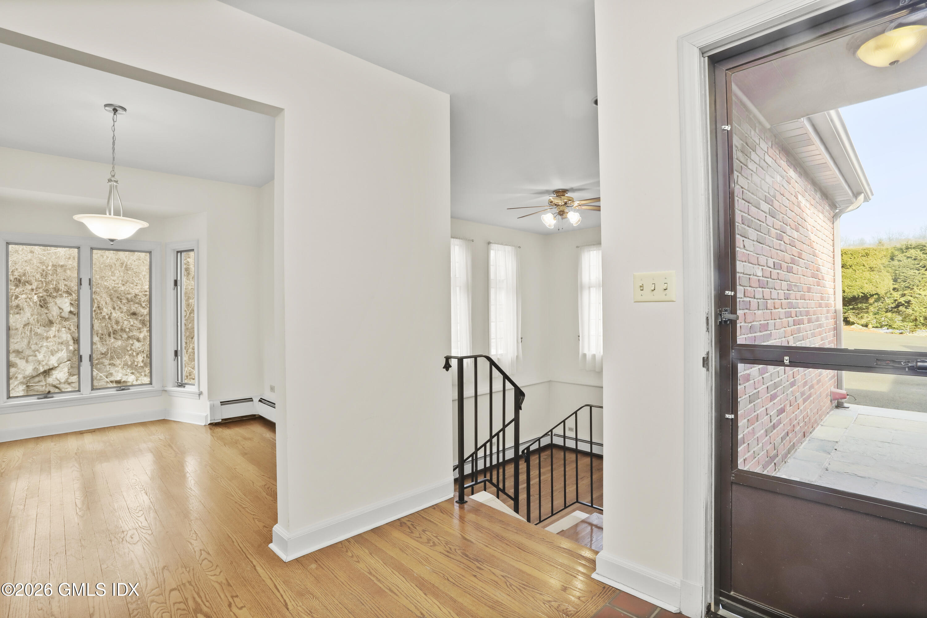 200 Weaver Street, Unit B Greenwich, CT 06831 - Photo 12 of 30 a view of an entryway with wooden floor and door