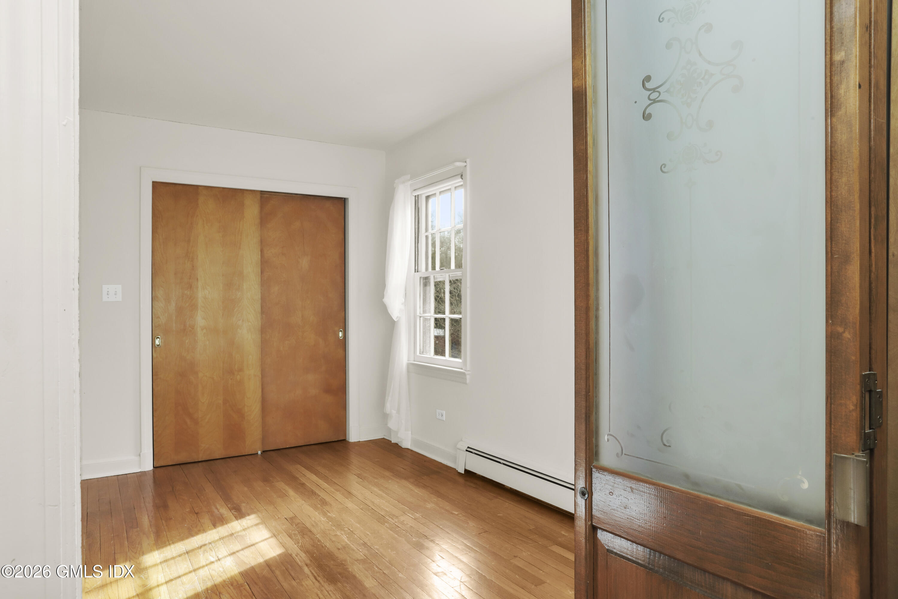 200 Weaver Street, Unit B Greenwich, CT 06831 - Photo 13 of 30 a view of an empty room and window
