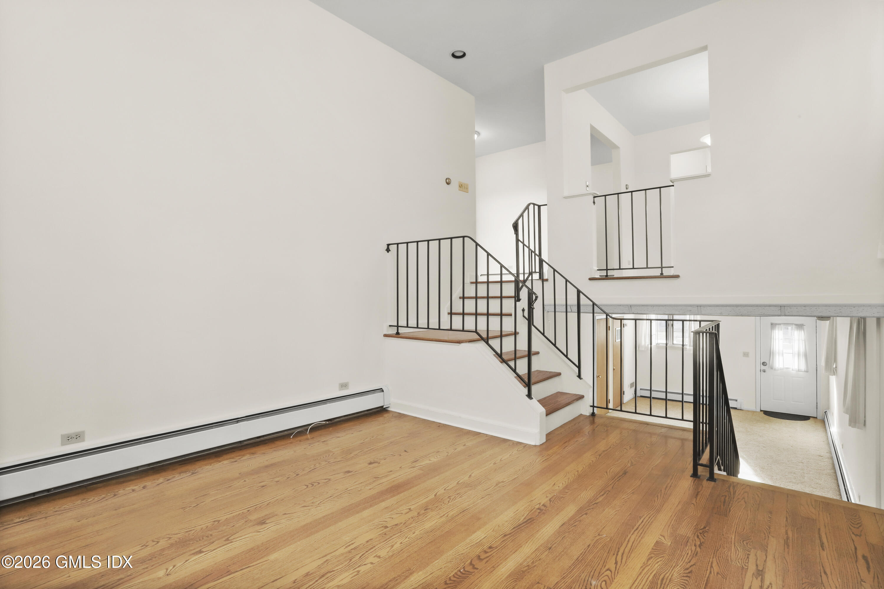 200 Weaver Street, Unit B Greenwich, CT 06831 - Photo 19 of 30 a view of entryway with wooden floor