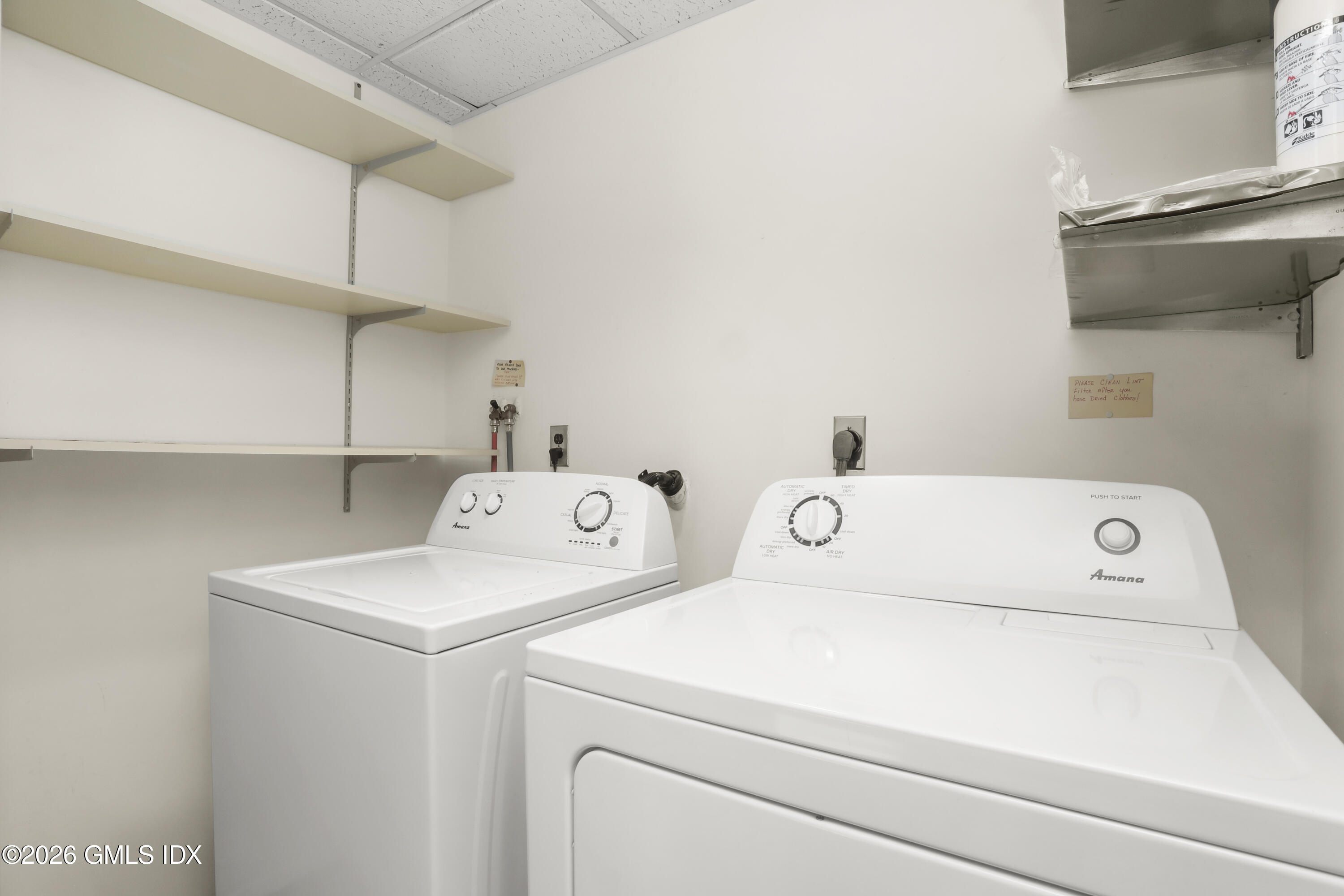 200 Weaver Street, Unit B Greenwich, CT 06831 - Photo 26 of 30 a utility room with dryer and washer