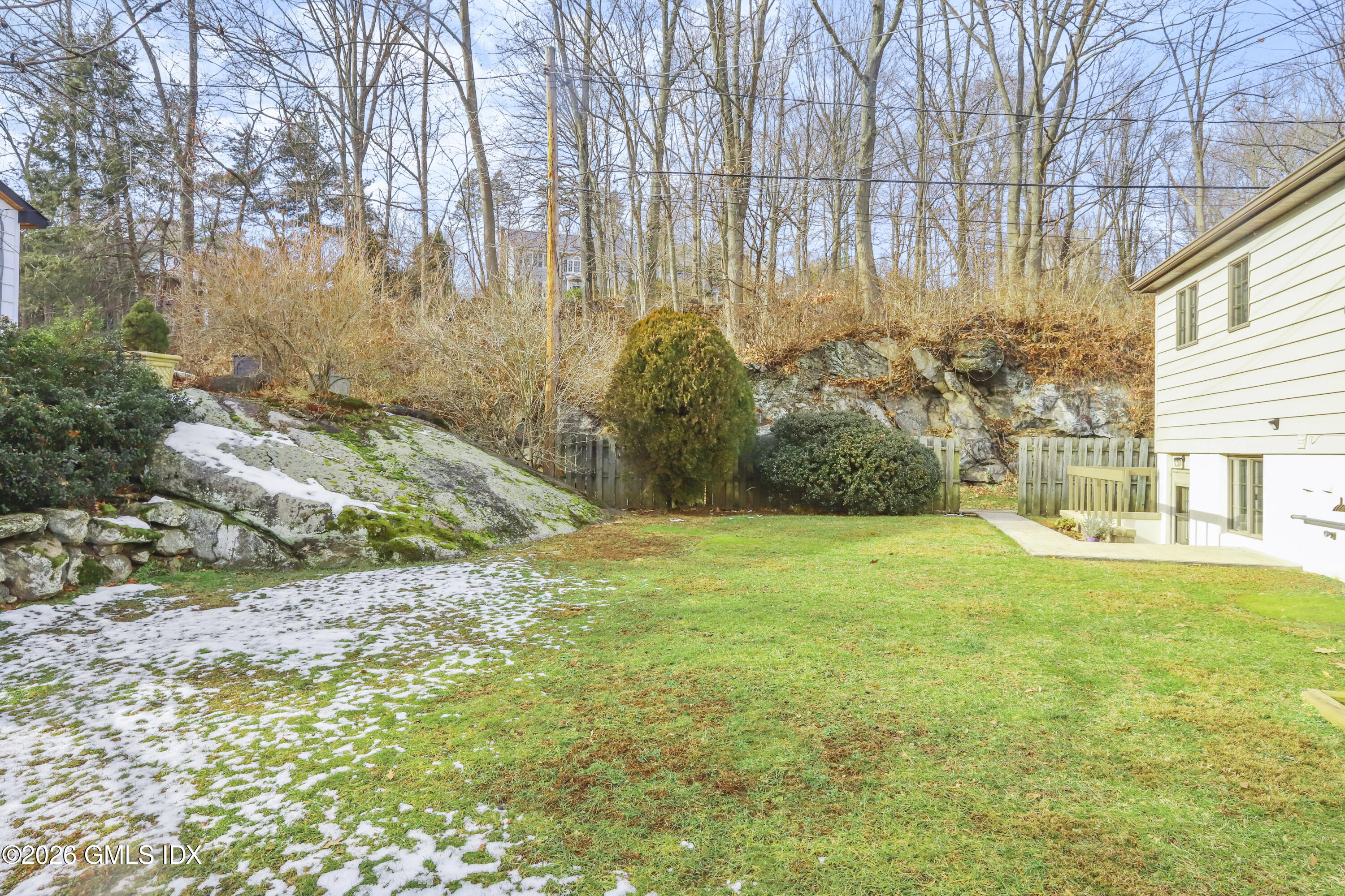 200 Weaver Street, Unit B Greenwich, CT 06831 - Photo 28 of 30 a view of a yard with an trees