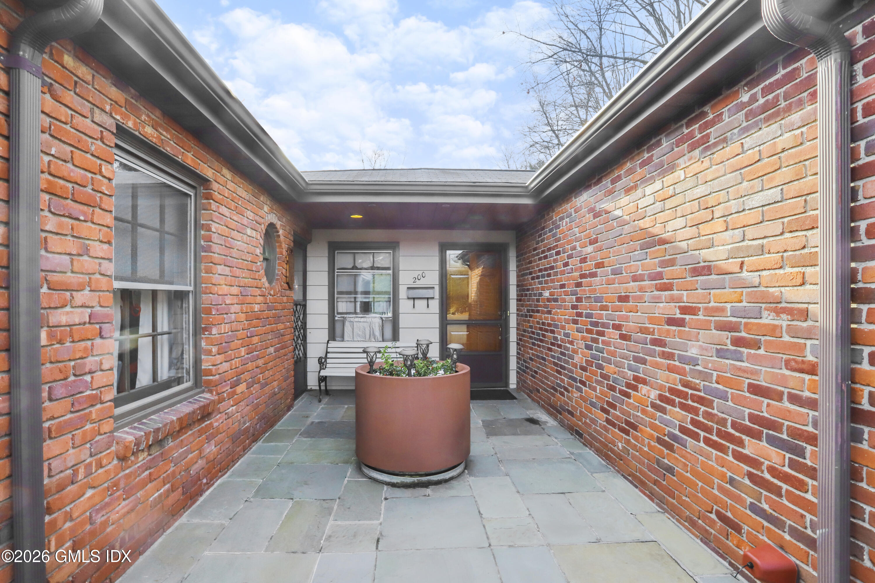 200 Weaver Street, Unit B Greenwich, CT 06831 - Photo 3 of 30 a view of outdoor space and porch