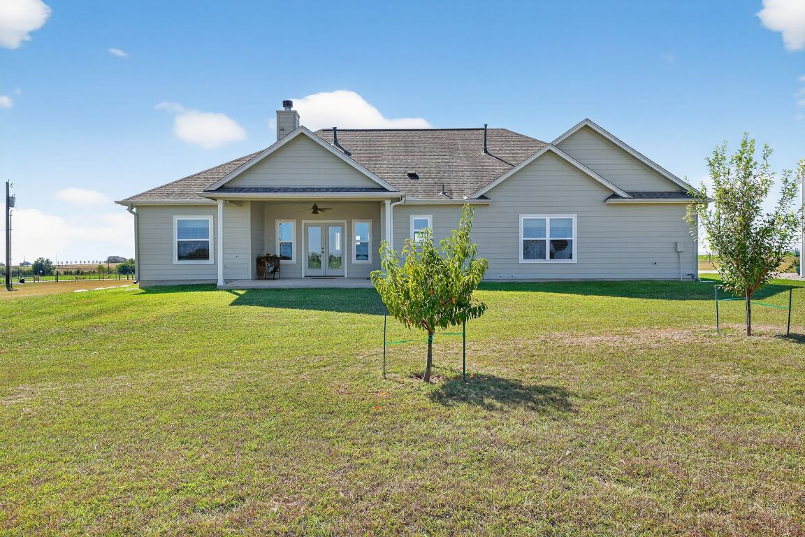 813 Cr 342 Road Granger, TX 76530 - Photo 24 of 32 a view of a house with a yard and potted plants