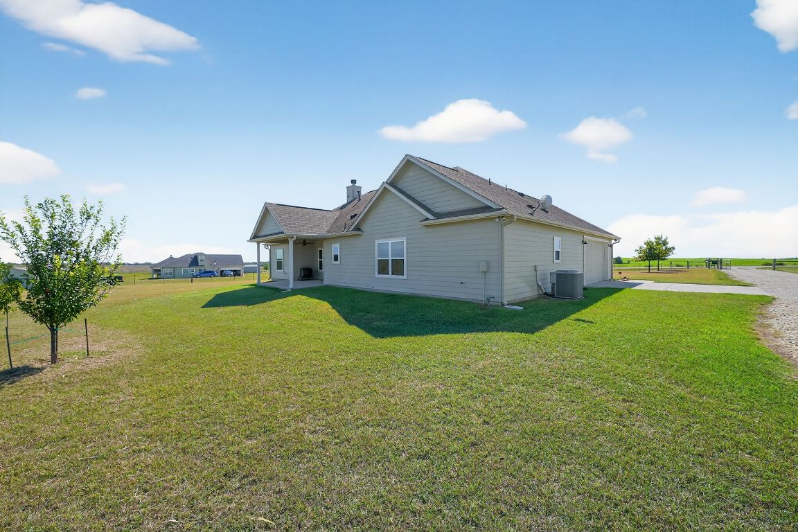 813 Cr 342 Road Granger, TX 76530 - Photo 25 of 32 a view of a house with a yard