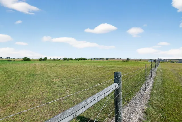 a view of a lake from a balcony