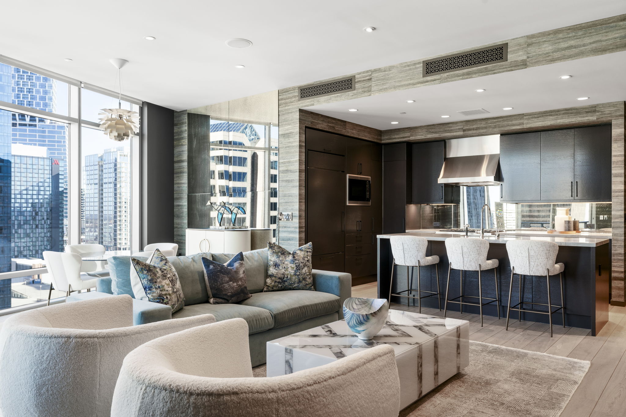 200 Congress Avenue, Unit 21D Austin, TX 78701 - Photo 16 of 34 Living room with expansive windows and recessed lighting