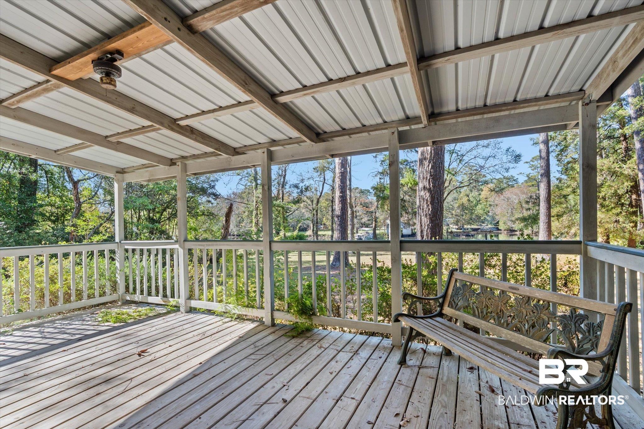 431 Simms Drive Saraland, AL 36571 - Photo 17 of 34 Unfurnished sunroom featuring a deck and healthy amount of natural light