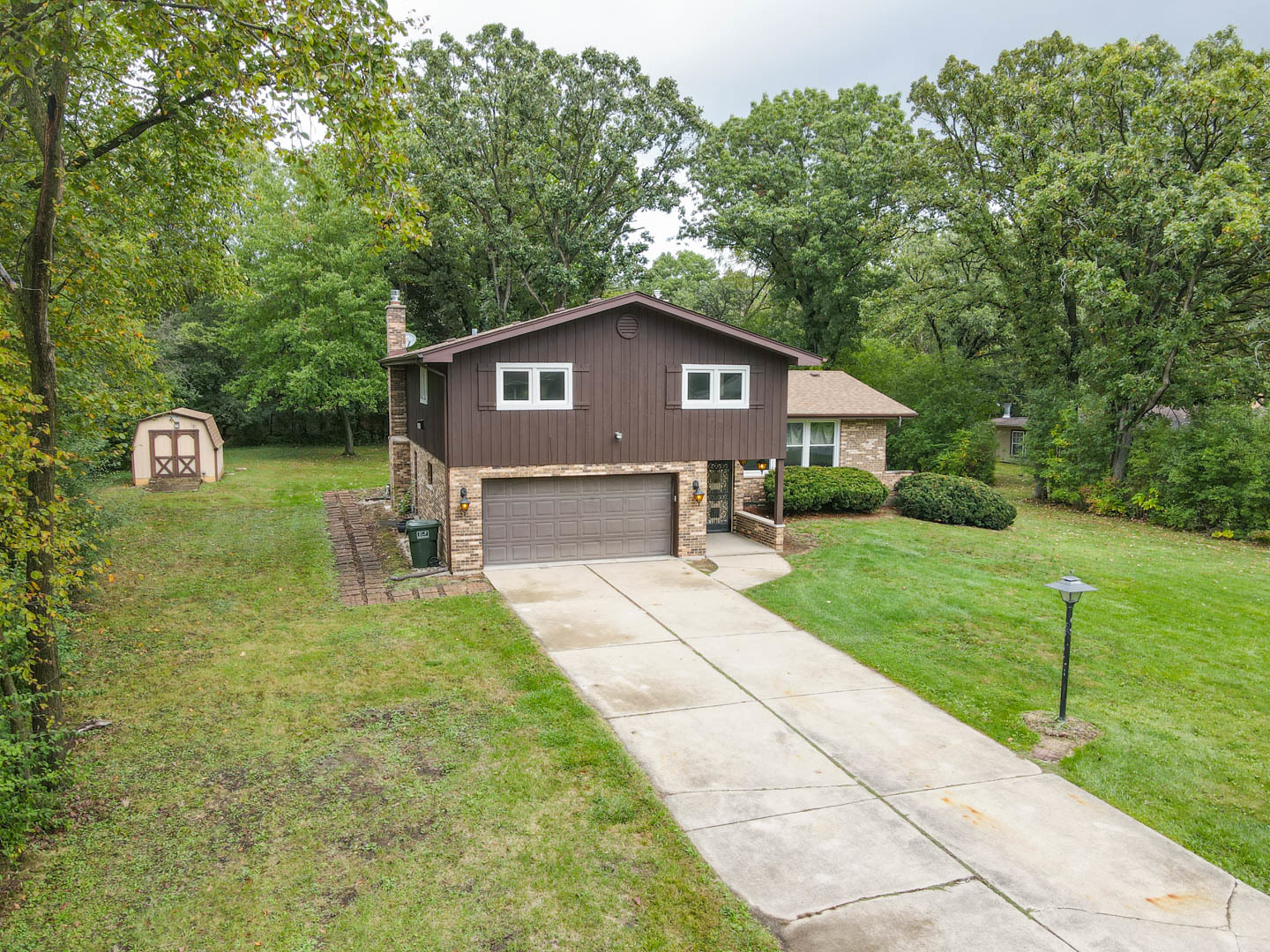 a house view with a garden space