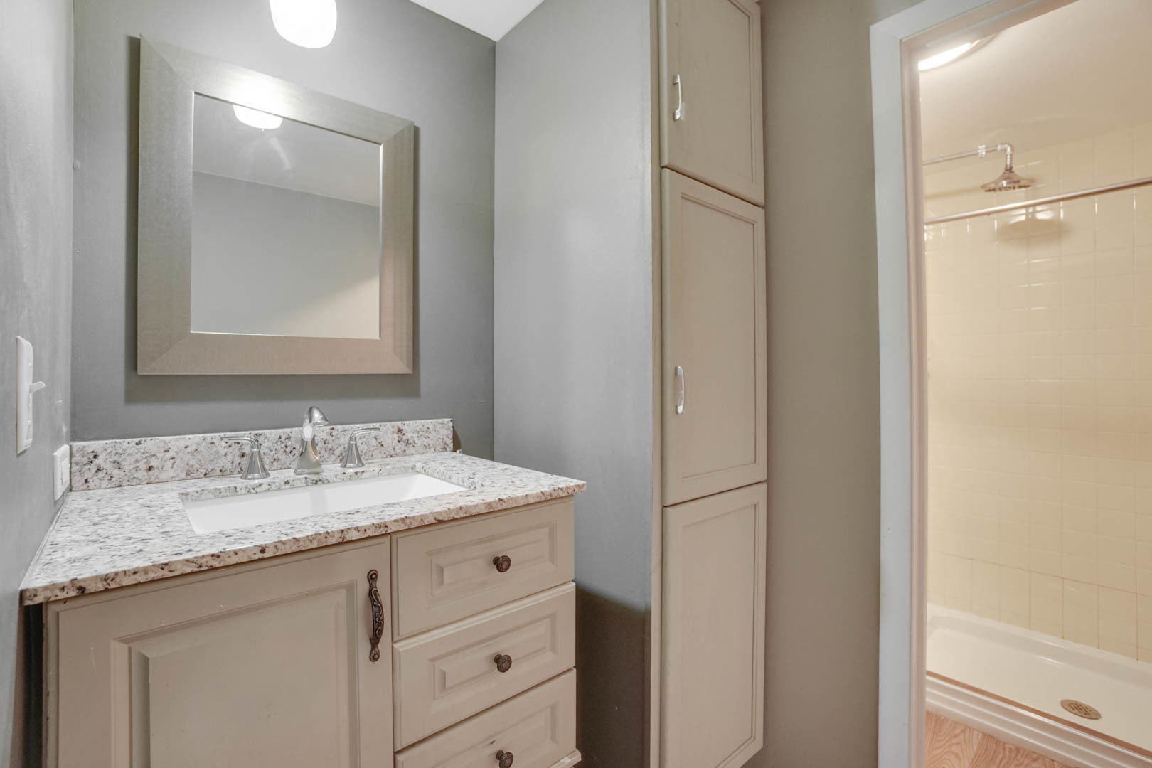 839 Highview Avenue Olympia Fields, IL 60461 - Photo 14 of 30 a bathroom with a granite countertop sink and a mirror