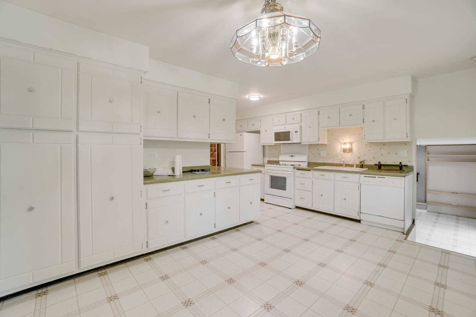 839 Highview Avenue Olympia Fields, IL 60461 - Photo 21 of 30 a kitchen with white cabinets and white appliances
