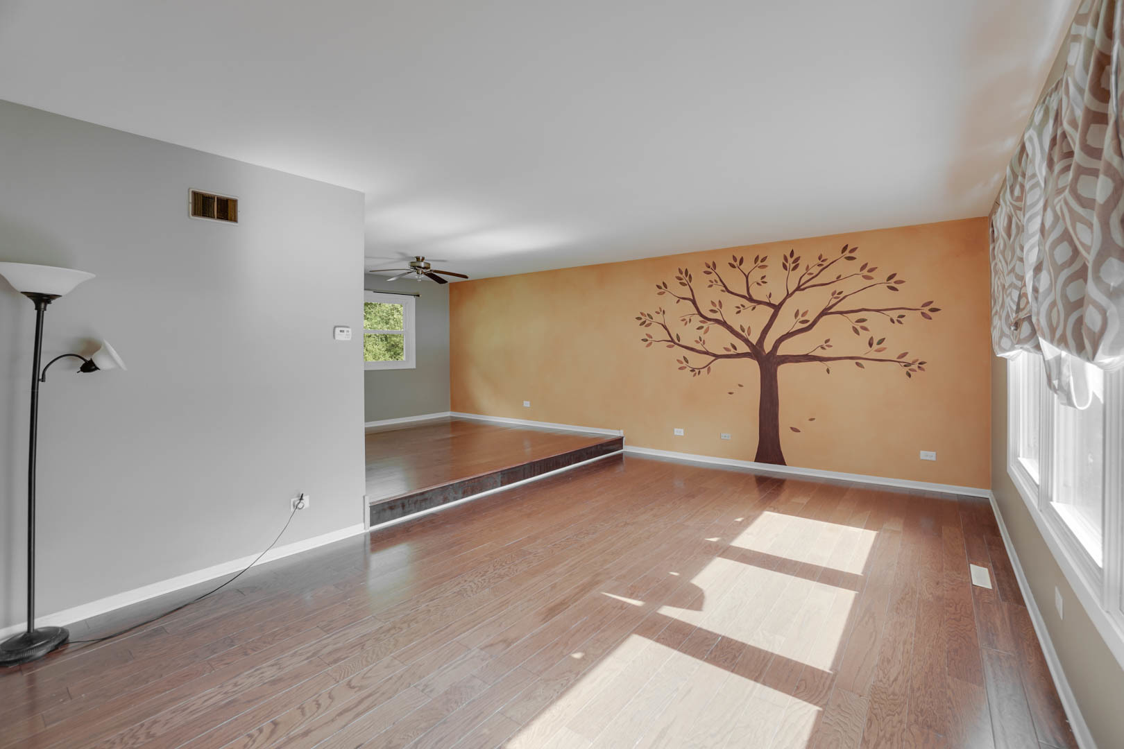 839 Highview Avenue Olympia Fields, IL 60461 - Photo 6 of 30 an empty room with wooden floor and windows