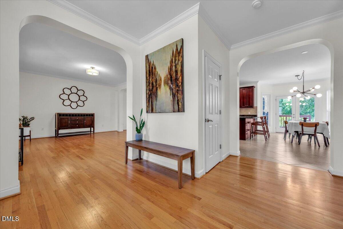 2908 Oak Bridge Drive Raleigh, NC 27610 - Photo 7 of 47 a view of a livingroom with furniture and hardwood floor