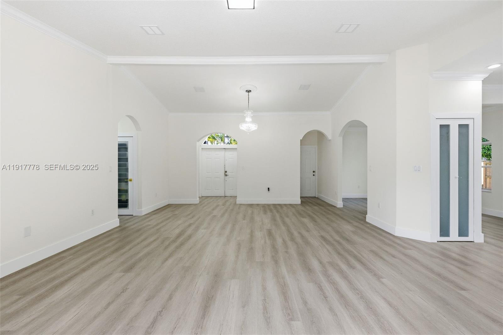 19601 Southwest 128th Court Miami, FL 33177 - Photo 12 of 59 a view of a room with wooden floor