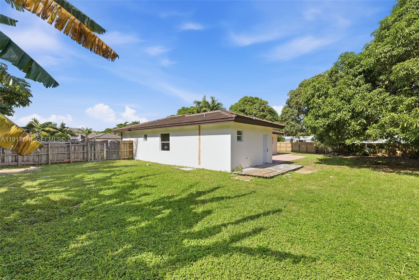 19601 Southwest 128th Court Miami, FL 33177 - Photo 37 of 59 a view of a backyard of the house