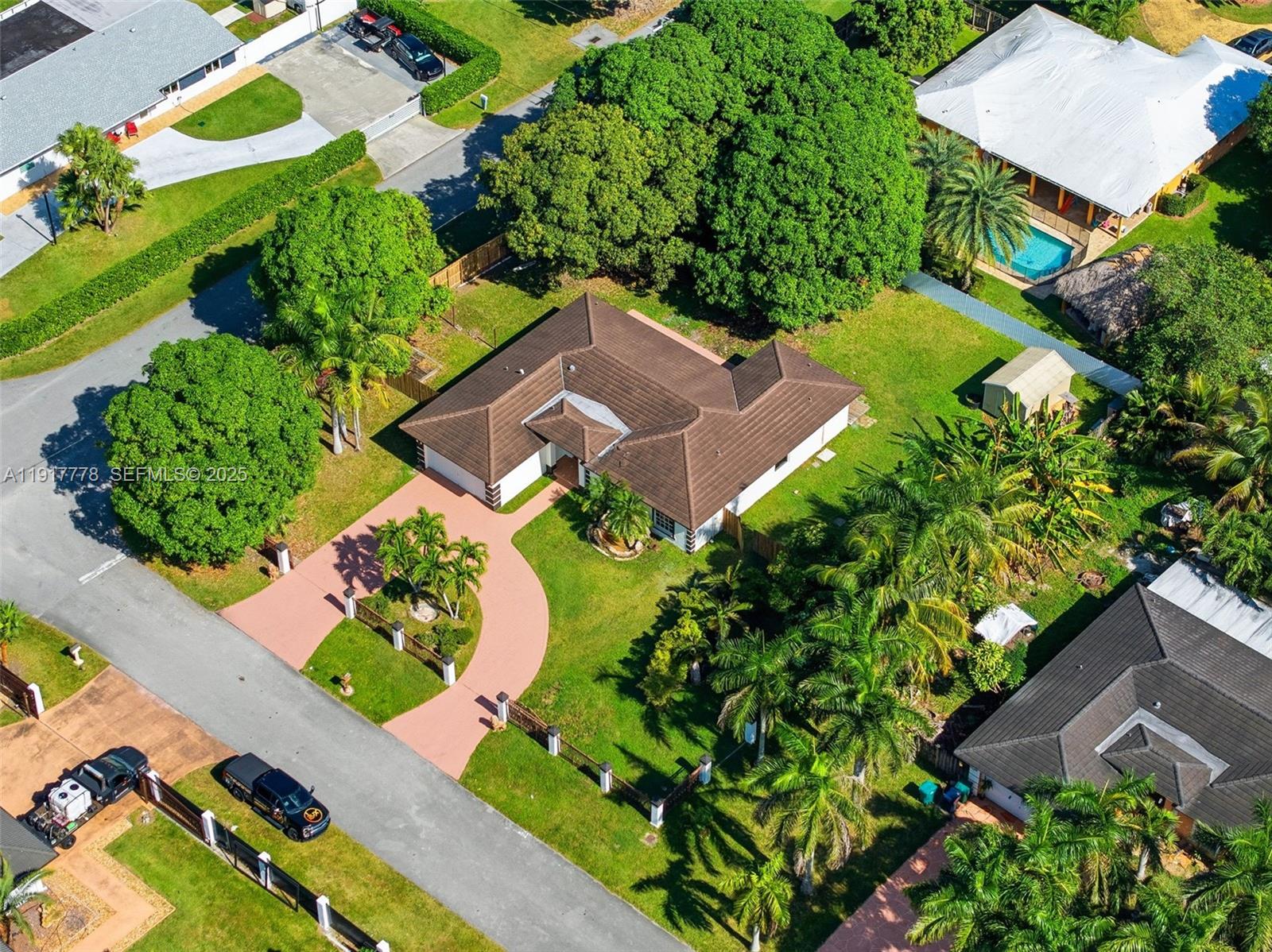 19601 Southwest 128th Court Miami, FL 33177 - Photo 39 of 59 an aerial view of a house with a yard