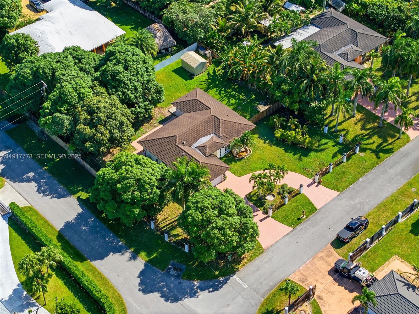 19601 Southwest 128th Court Miami, FL 33177 - Photo 41 of 59 an aerial view of a house with a yard