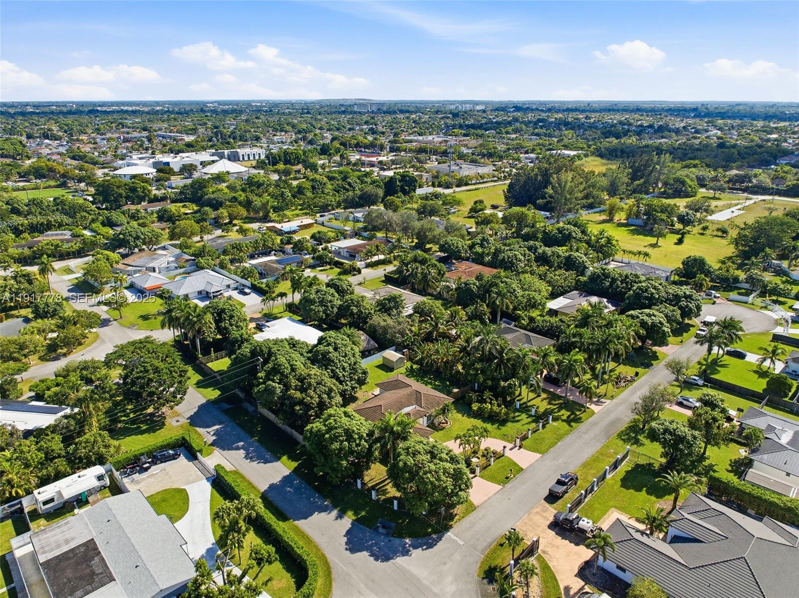 19601 Southwest 128th Court Miami, FL 33177 - Photo 47 of 59 an aerial view of residential houses with outdoor space