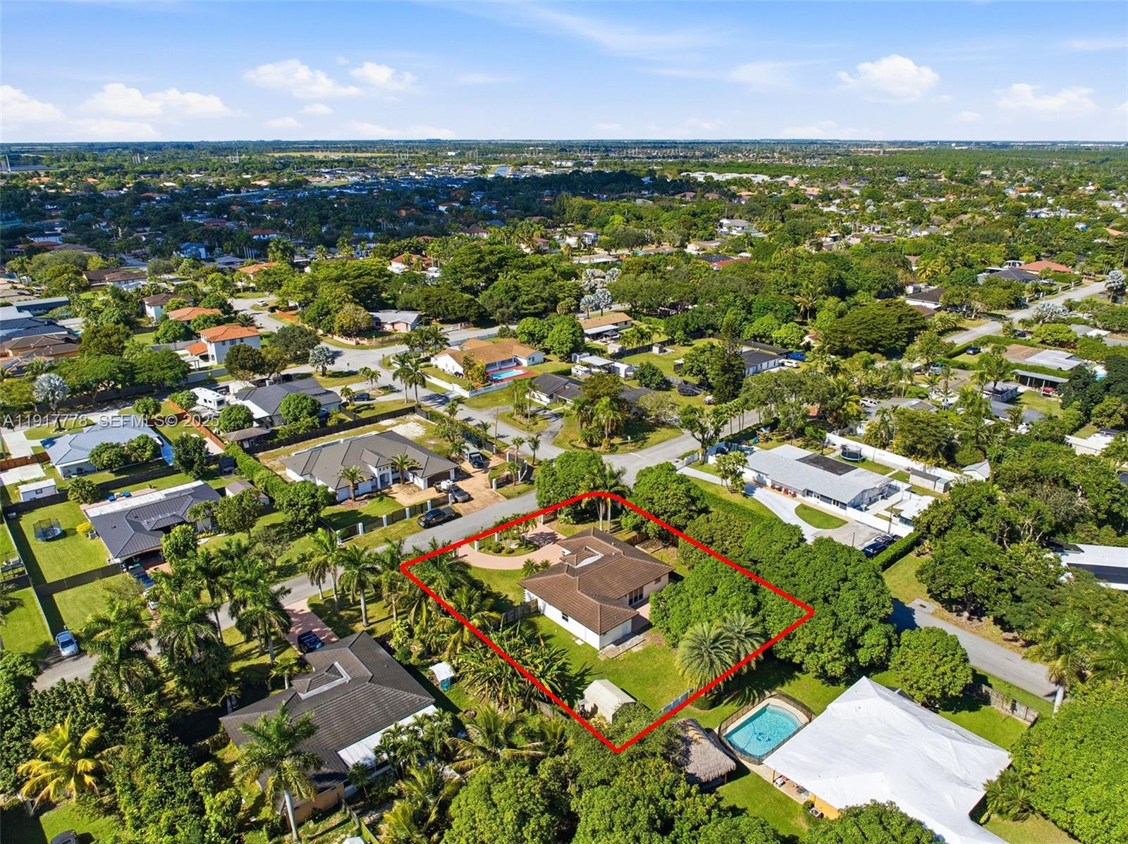 19601 Southwest 128th Court Miami, FL 33177 - Photo 54 of 59 an aerial view of residential houses with outdoor space