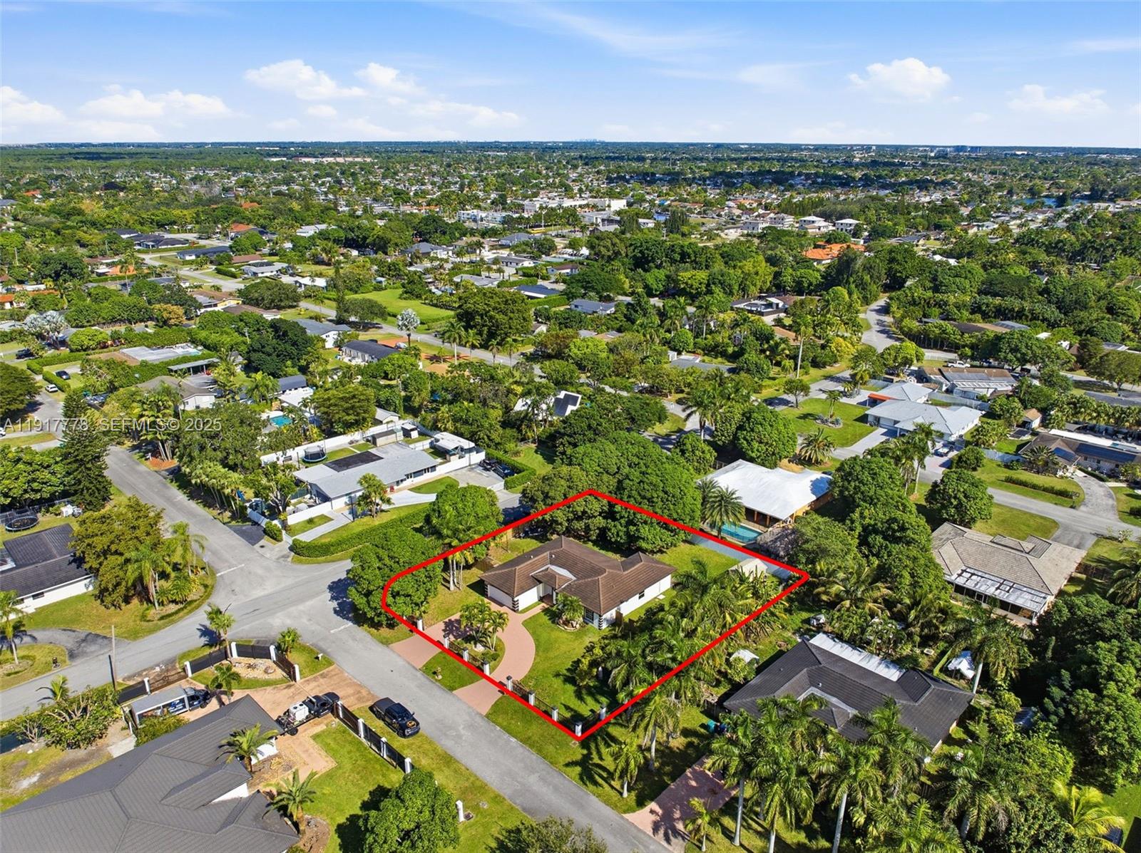 19601 Southwest 128th Court Miami, FL 33177 - Photo 58 of 59 an aerial view of residential houses with outdoor space and trees