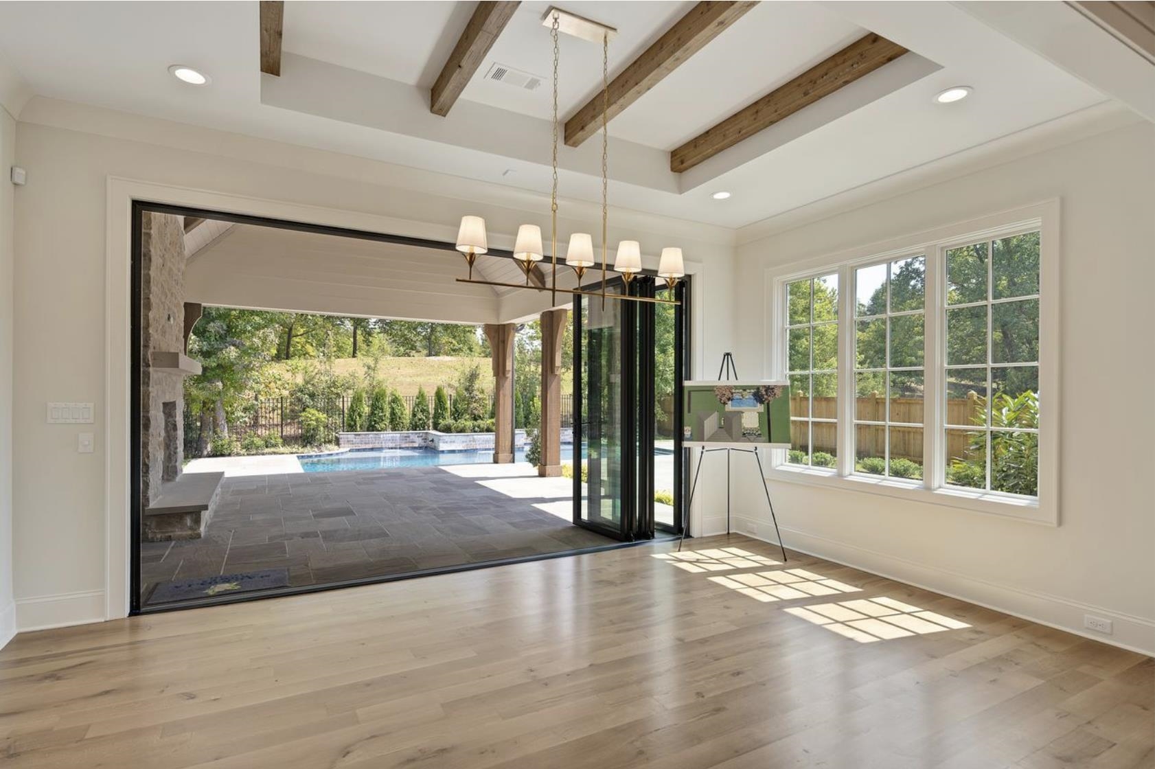 650 Bushchat Lane Collierville, TN 38017 - Photo 21 of 40 Entryway with beamed ceiling, wood finished floors, and recessed lighting