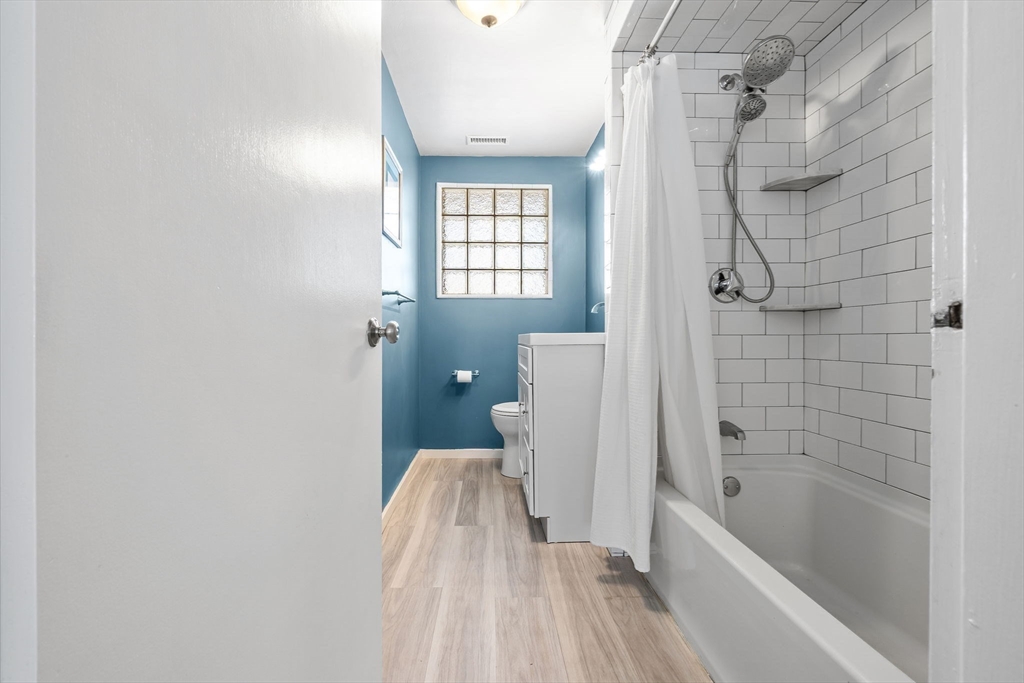 43 Colgate Road Beverly, MA 01915 - Photo 11 of 27 a bathroom with a bathtub and a shower