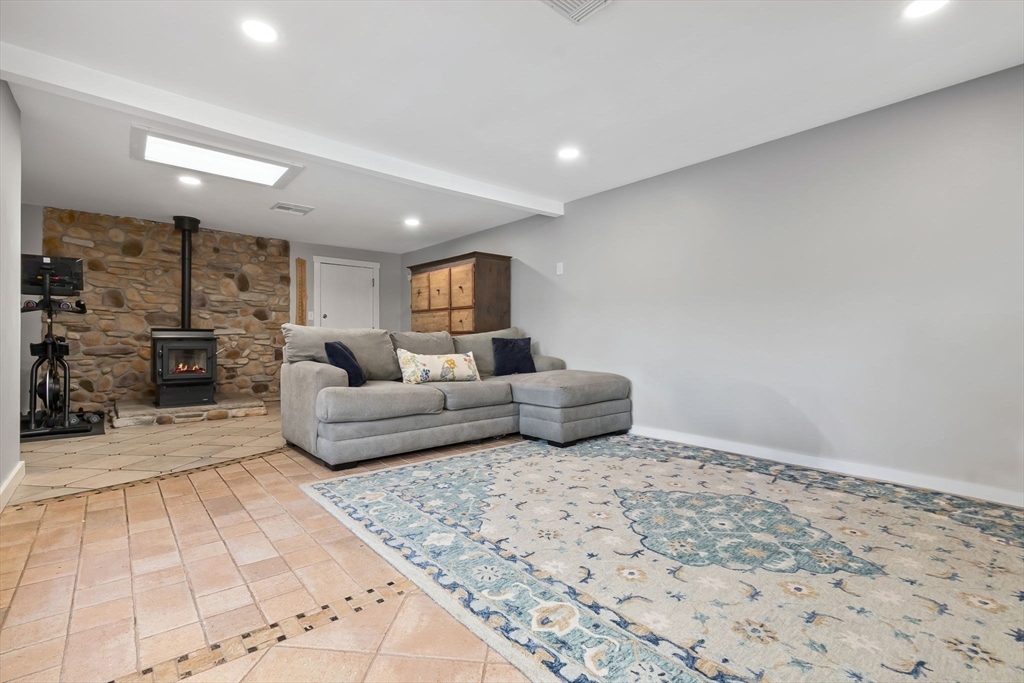 43 Colgate Road Beverly, MA 01915 - Photo 14 of 27 a living room with furniture and a rug